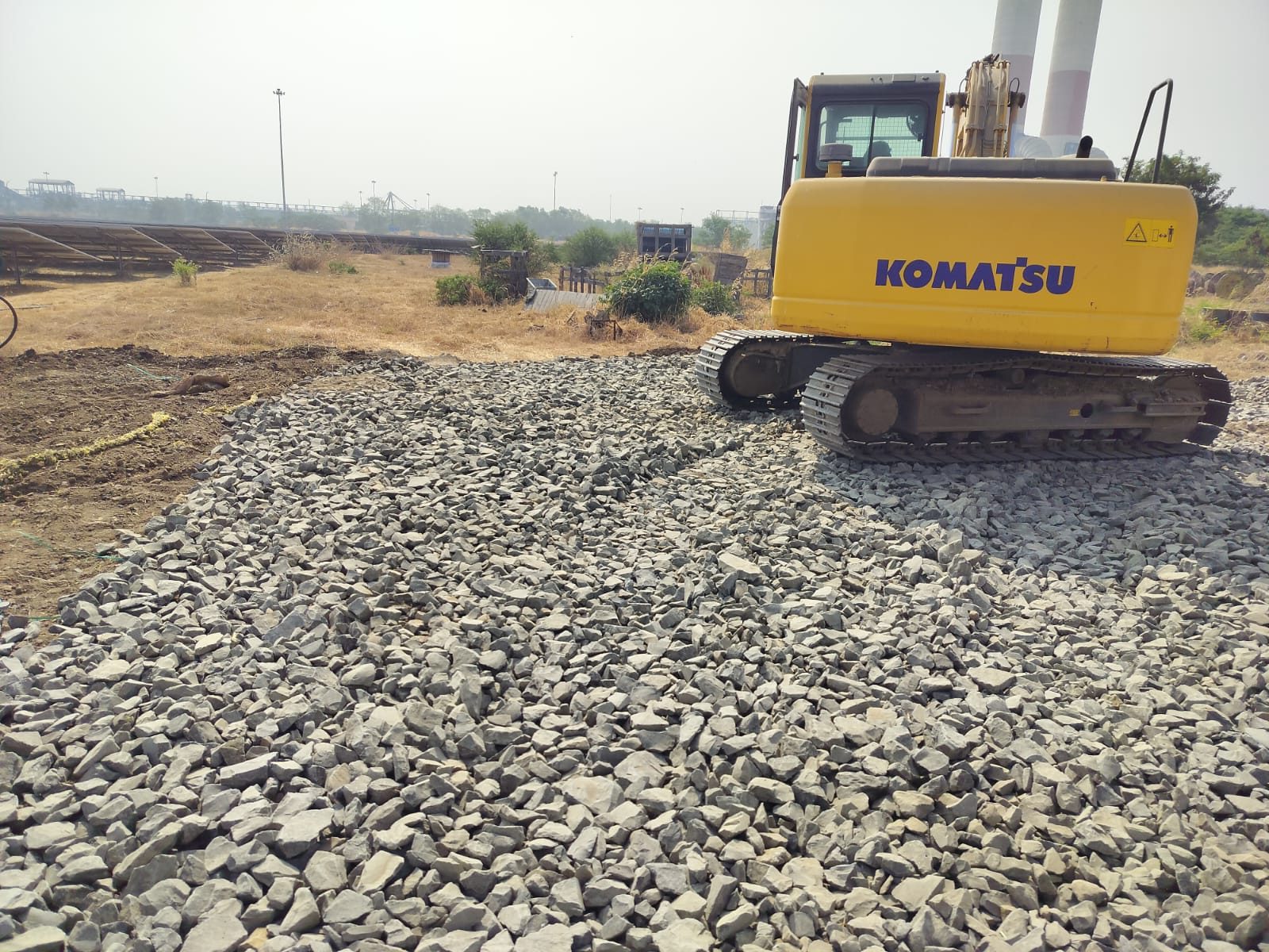 Excavator and stone soling work